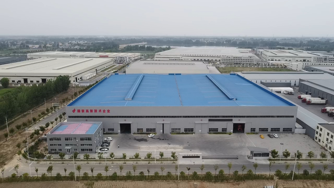 Aerial view of a large industrial fertilizer production facility and surrounding plant area